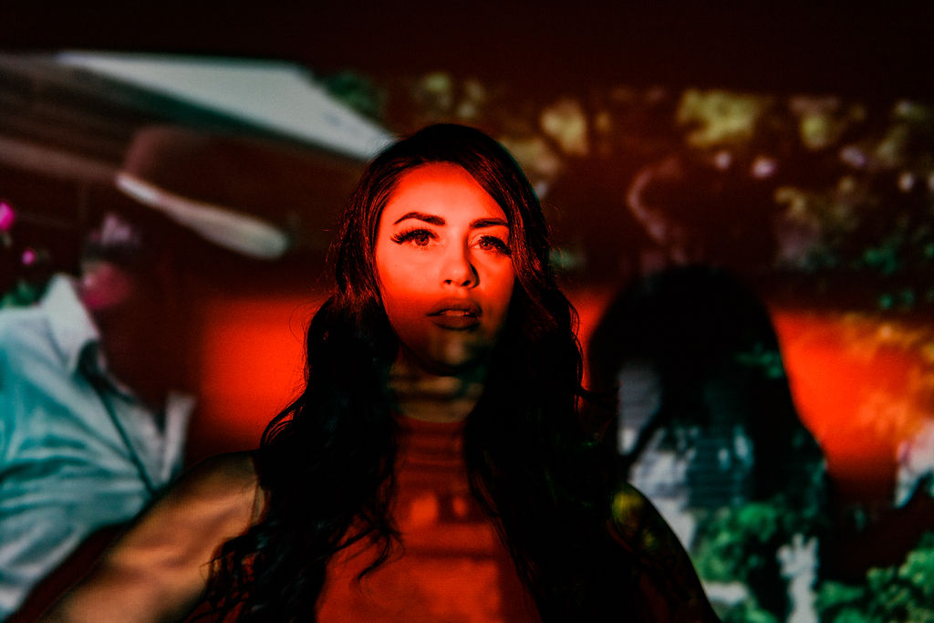 red light on model for fine-art photography series by chris daniels