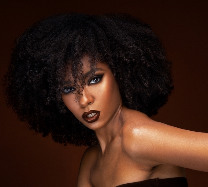 Portrait of Black woman by Leslie Andrews.